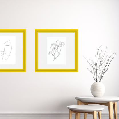 [LIFESTYLE],Sunburst Yellow Wide Width Wall Frame in a room
